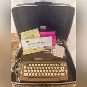 Brown Electric Typewriter